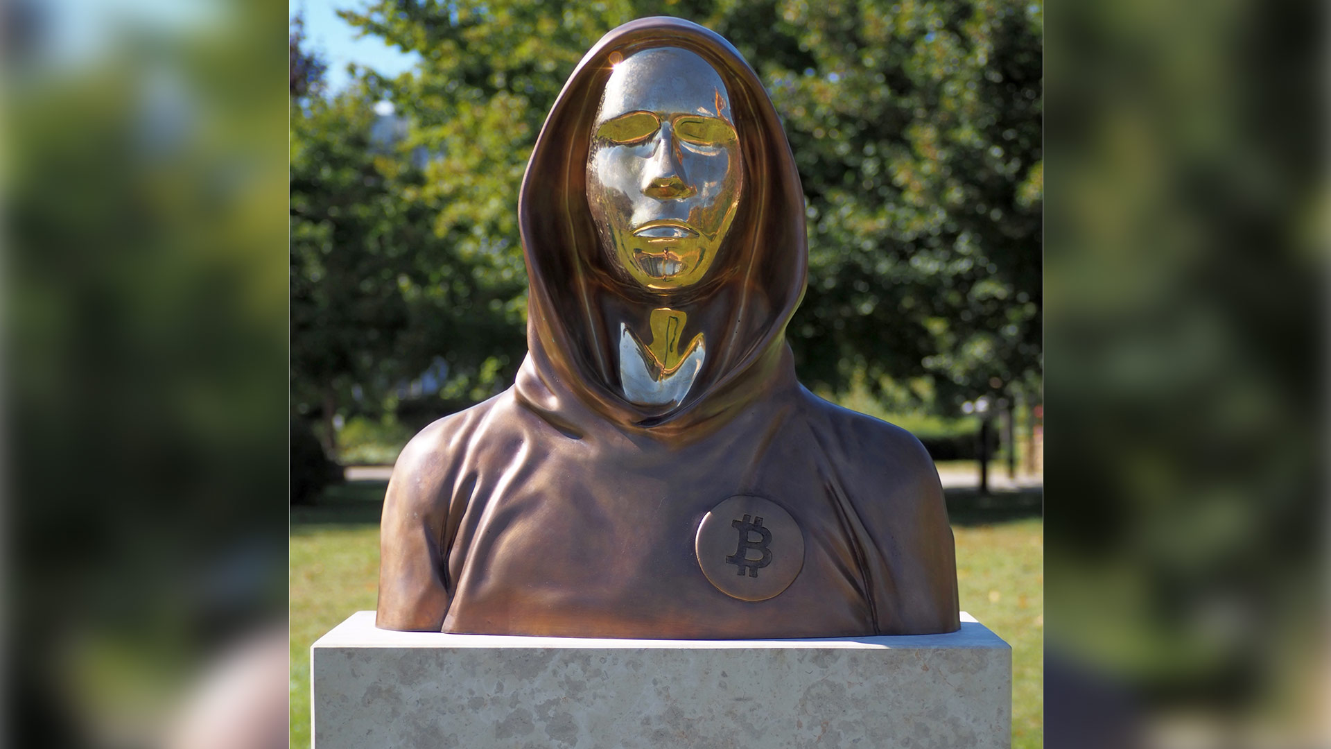 Bust of Satoshi Nakamoto, creator of bitcoin, erected in the Graphisoft Park in Budapest. The statue made of bronze and aluminum alloy by Tamás Gilly and Réka Gergely was inaugurated on September 16, 2021 at the initiative of the Hungarian Crypto Academy. (Budapest, District III, Záhony Street) - cropped to 16:9