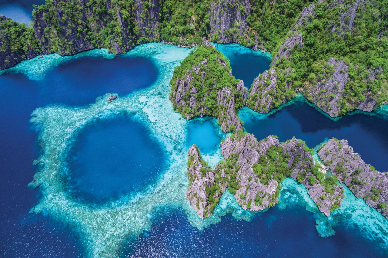 Banwa Island, Philippines. An aerial view of its beautiful lagoons and limestone cliffs.