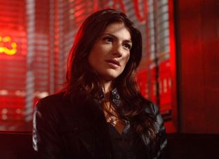 Genevieve Cortese plays Kristy, a small town waitress who gets romantically involved with Sam (Jared Padalecki)