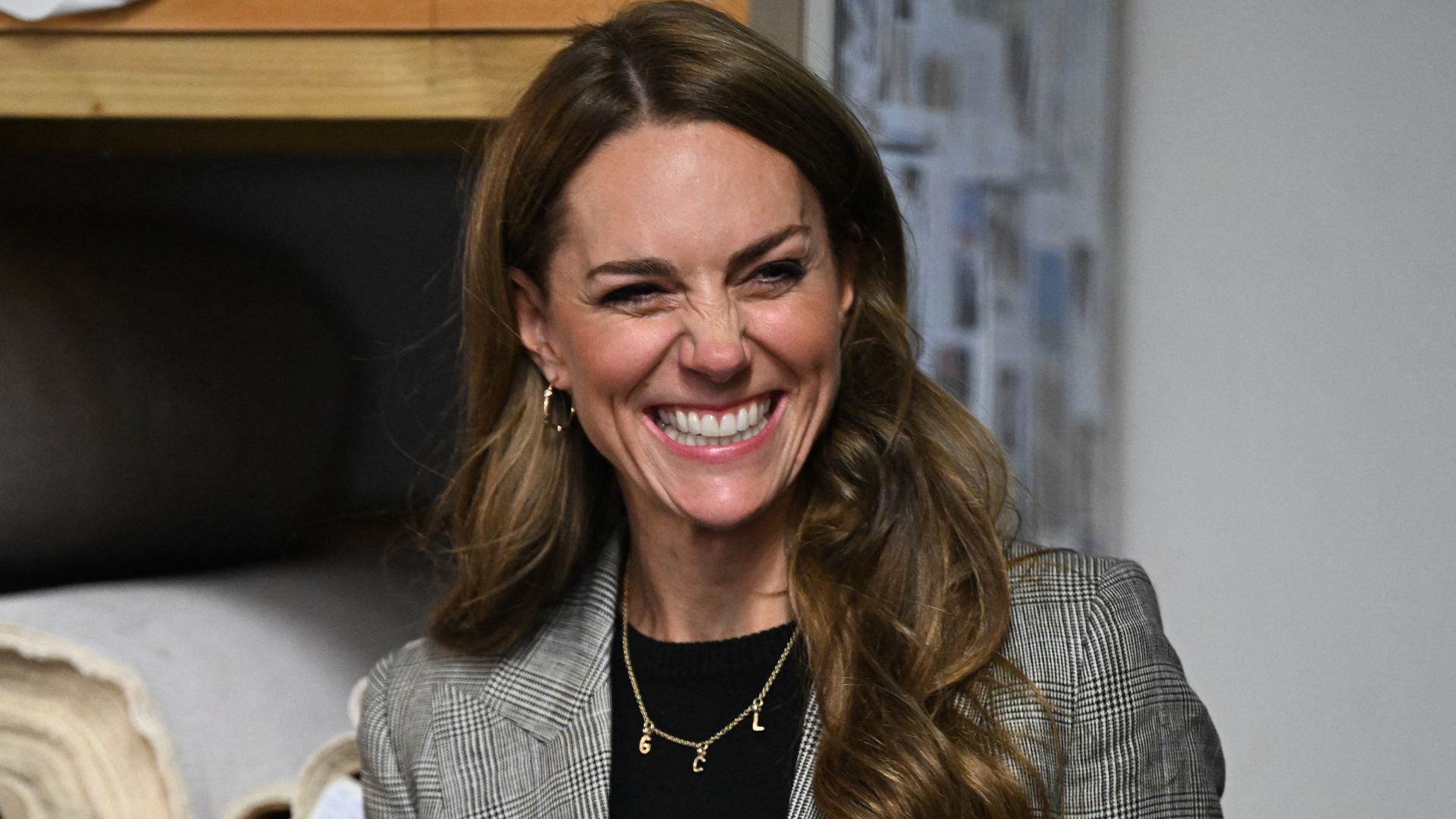 Kate Middleton attends engagement in in Sudbury wearing a plaid suit