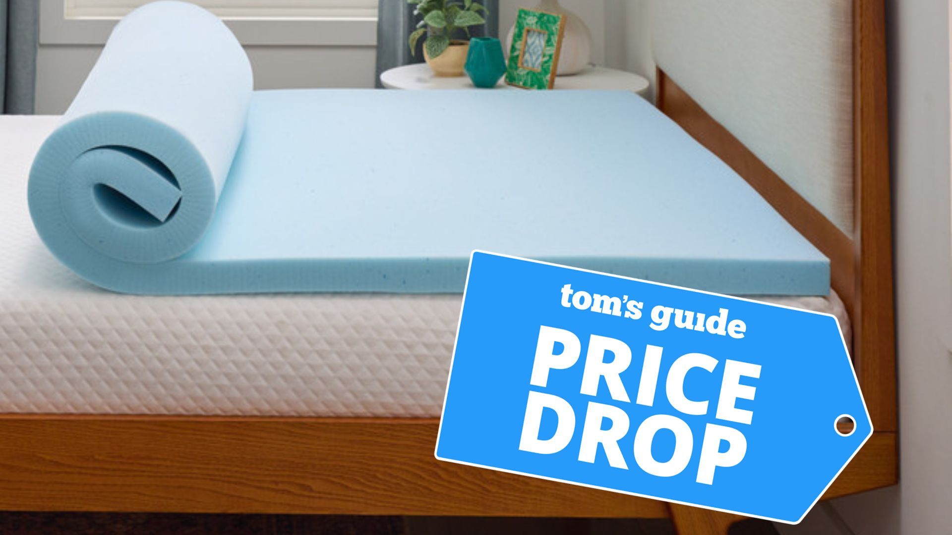 The Linenspa Gel Memory Foam Mattress Topper rolled out on a bed