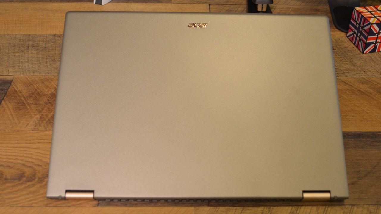 An Acer Spin 5 (2022) on a wooden deskl