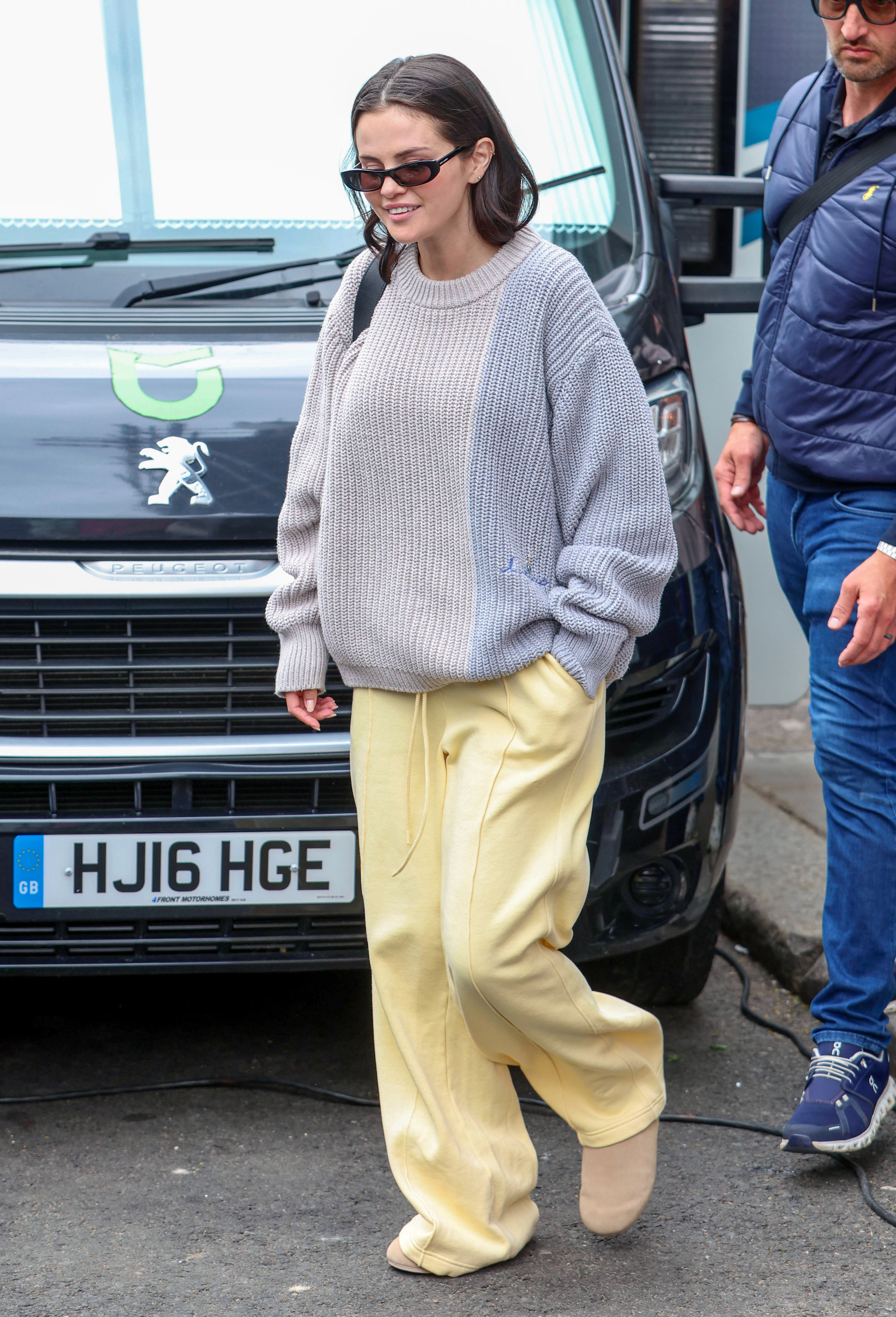 Selena Gomez proved the butter yellow trend is a summer neutral with baggy sweatpants