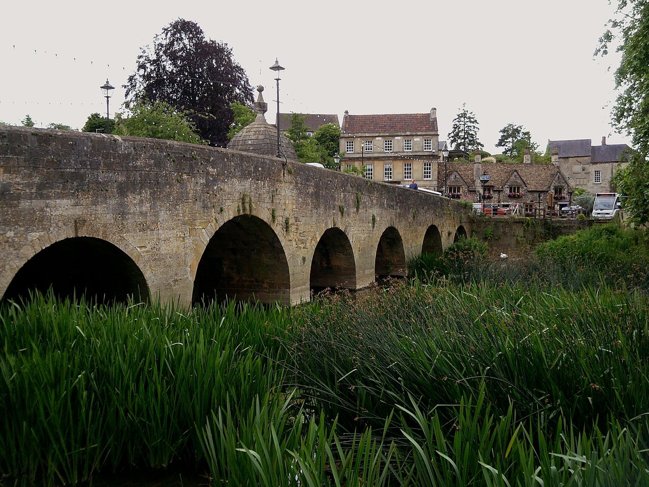 Photograph of a bridge over the River Avon, taken with Camp Snap 2, image is a little more saturated and has a purple tint