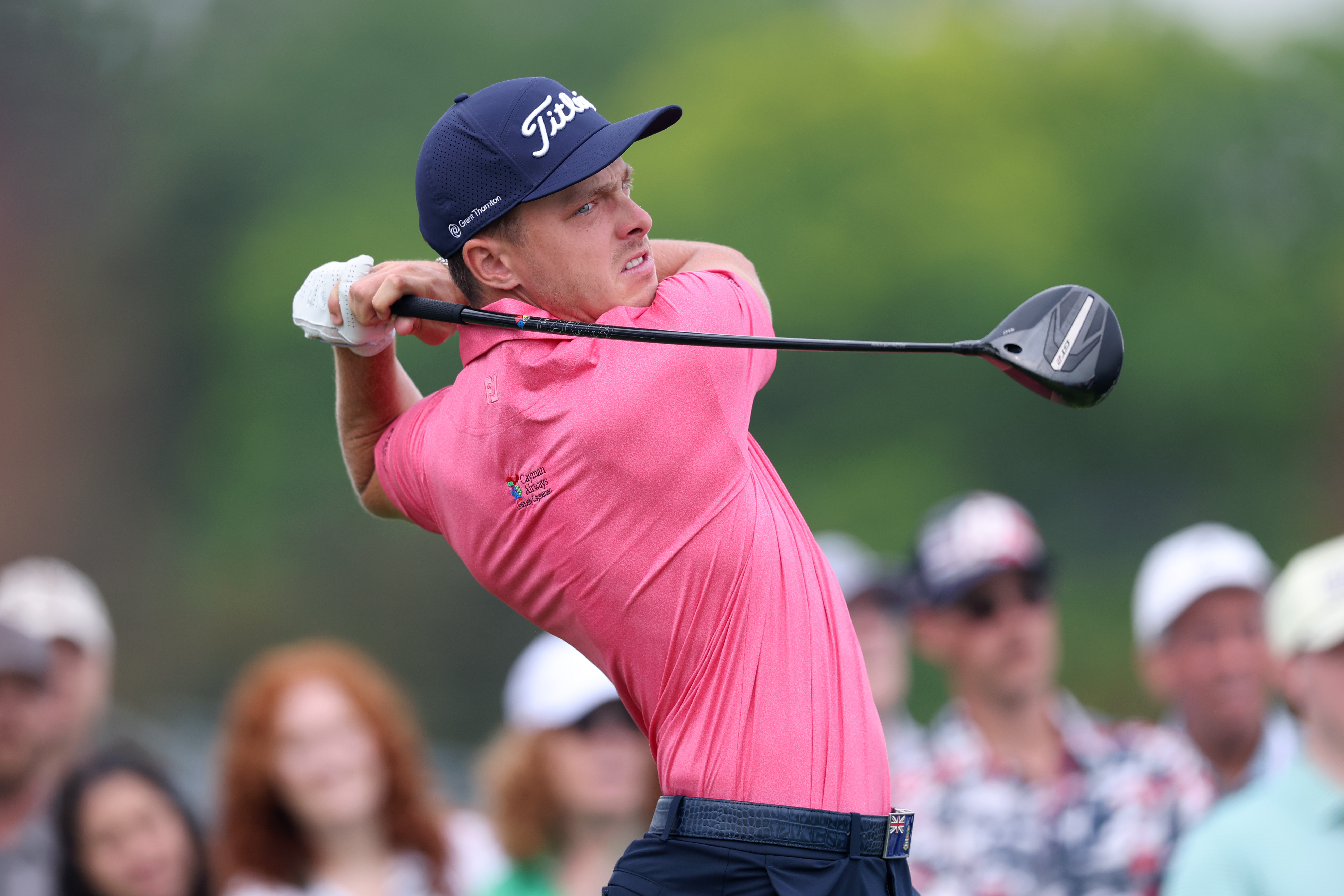 Justin Hastings hits a tee shot with a driver