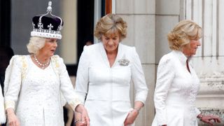 Queen Camilla, Queen's Companions Fiona, Marchioness of Lansdowne and Annabel Elliot watch an RAF flypast