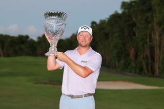 Brice Garnett holds the Puerto Rico Open trophy