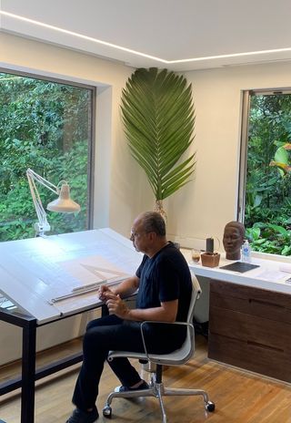 Architect and designer Arthur Casas in his home office at Casa Iporanga