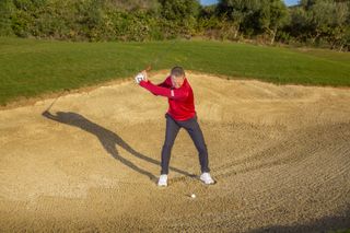 The backswing when playing a greenside bunker shot