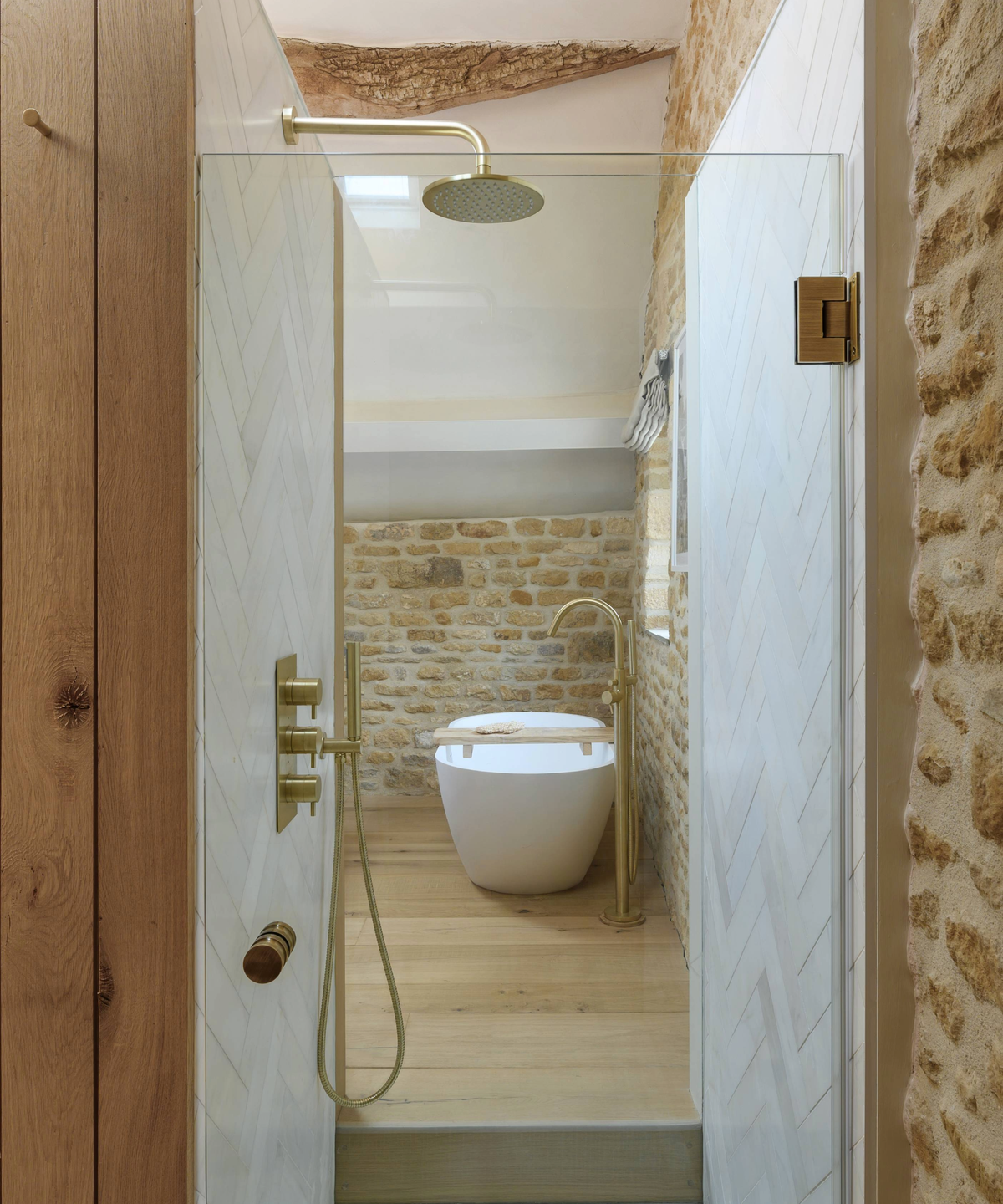 View through the shower enclosure onto the bathroom