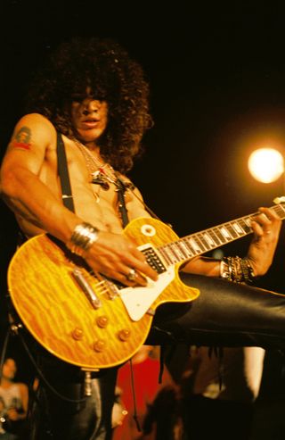 Slash performs live with the Hunter Burst Gibson Les Paul