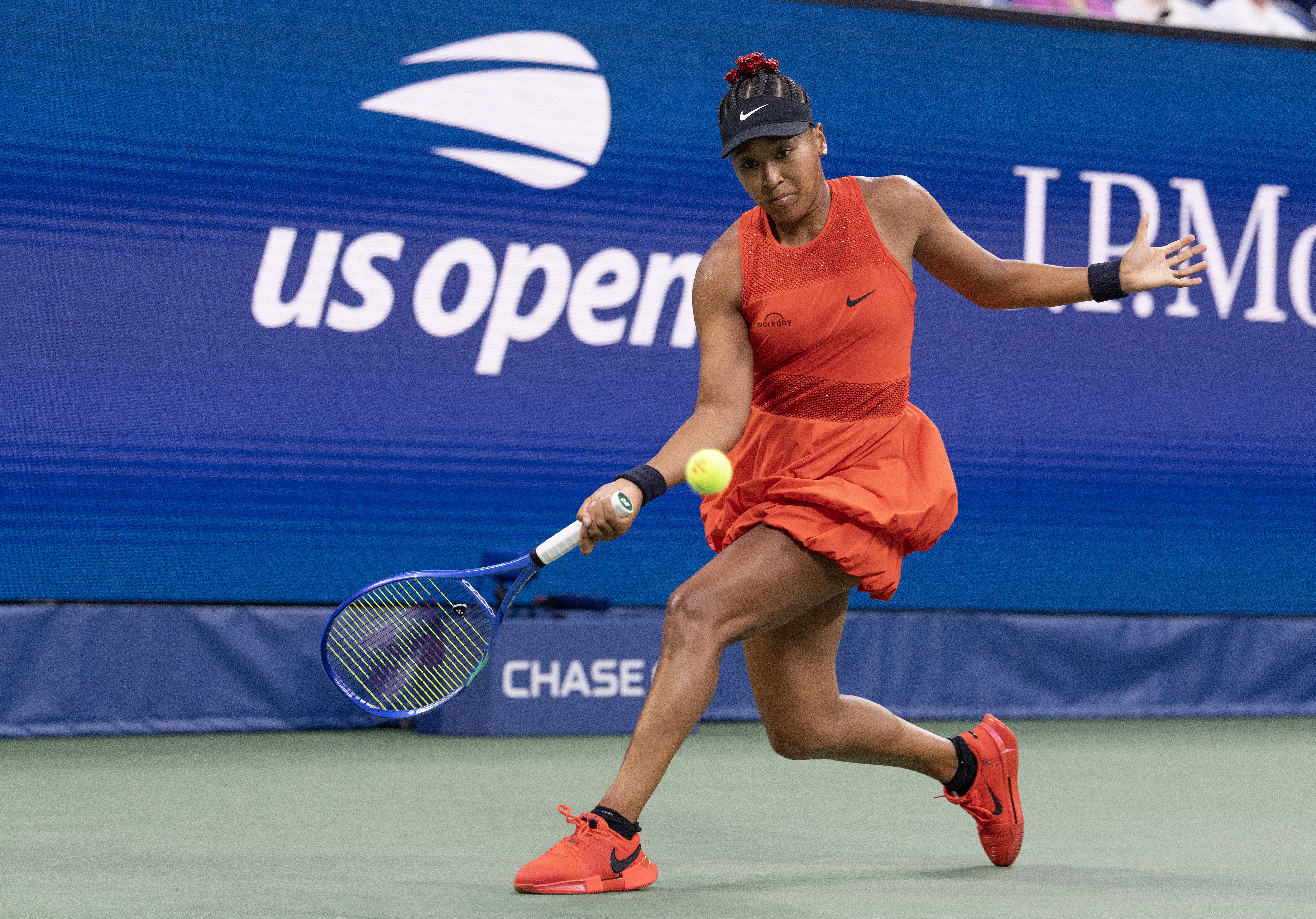 Naomi Osaka wearing a Nike red bubble skirt covered in rhinestones at the 2025 US Open