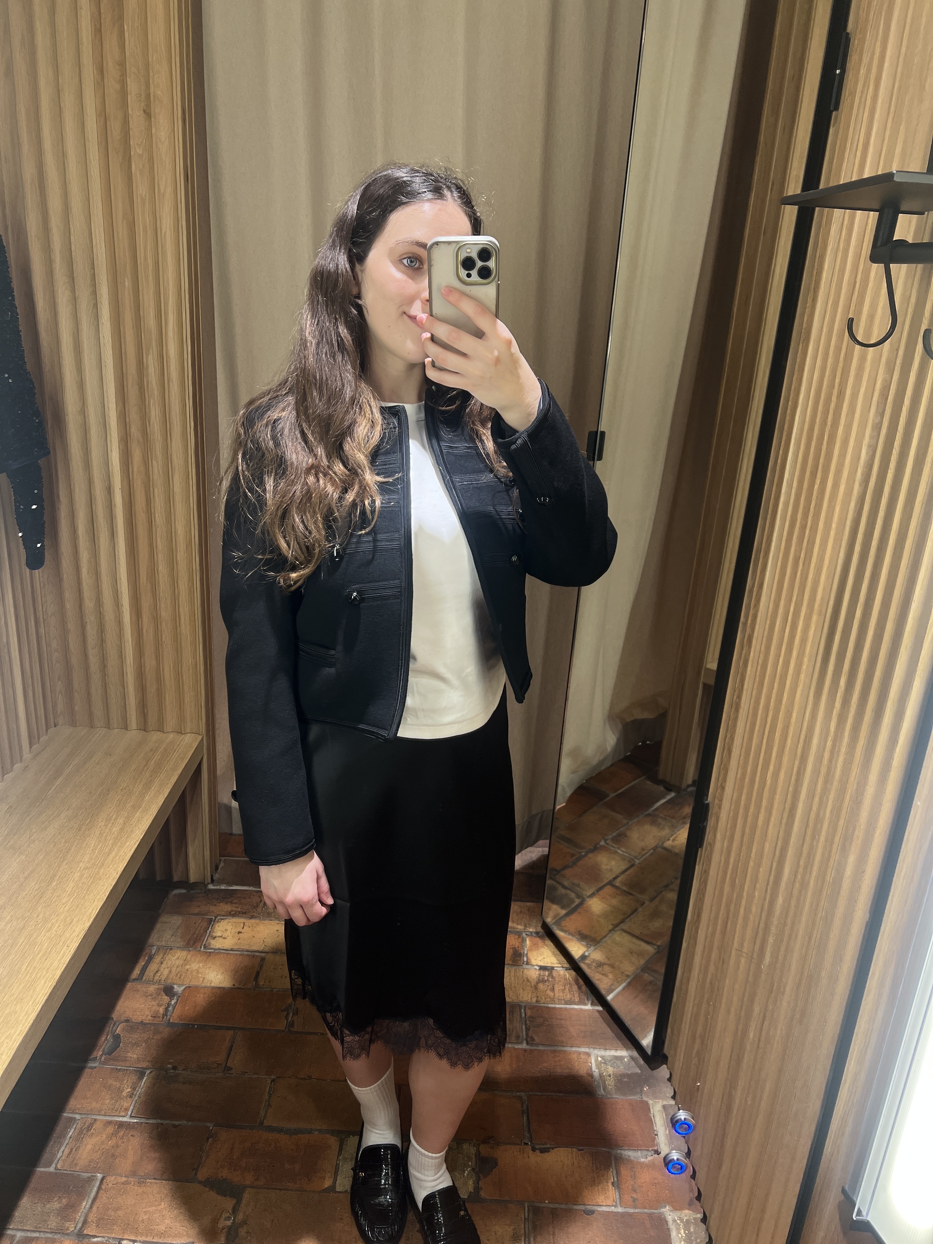 An image of Who What Wear UK's SEO Writer Ava Gilchrist wearing a satin skirt from Mango.