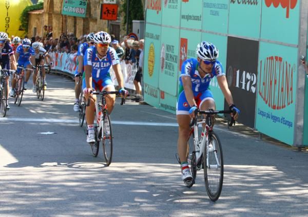 The Italian riders come to the line