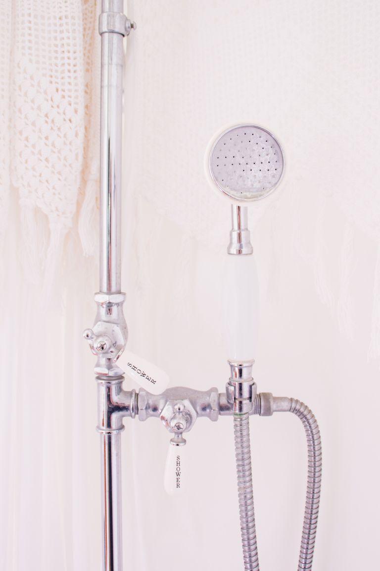 How to clean a shower head descale it with vinegar and more Real Homes