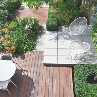 garden area with white table and trees