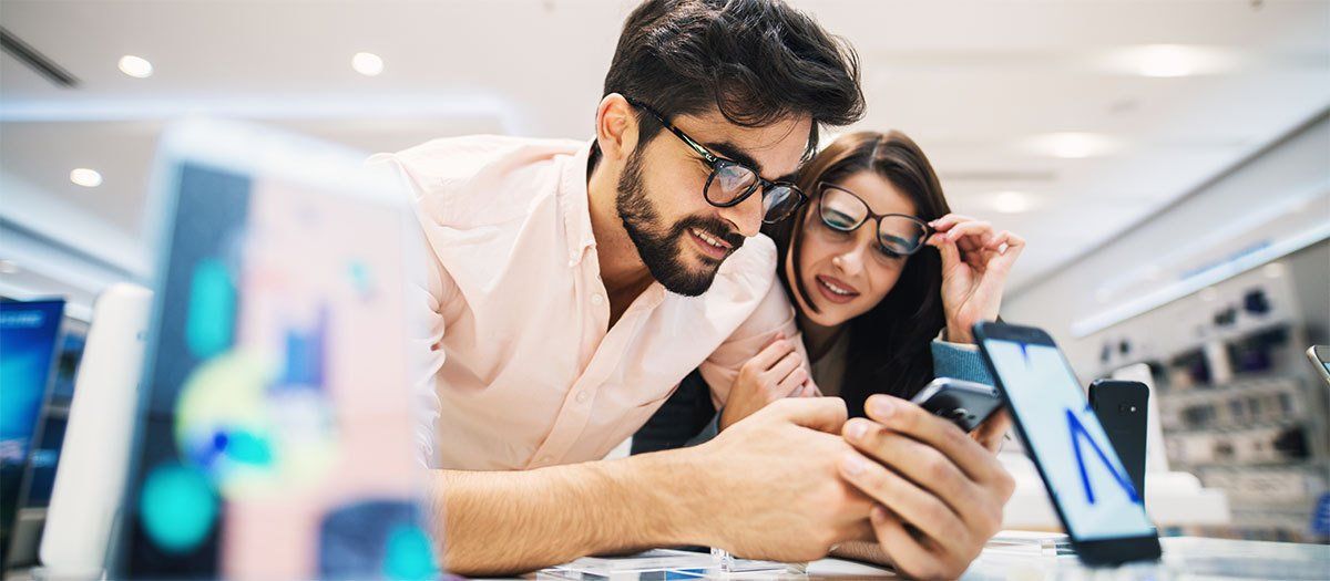 Couple looking at phones