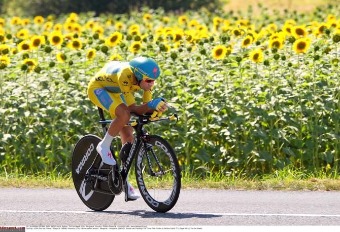 A classic Tour shot of the yellow jersey and a field of sunflowers