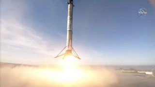 The Falcon 9 first stage booster comes is seen just before touchdown on SpaceX's Landing Zone 4 at Vandenberg Air Force Base, California after launching the Sentinel-6 Michael Freilich satellite into orbit on Nov. 21, 2020.