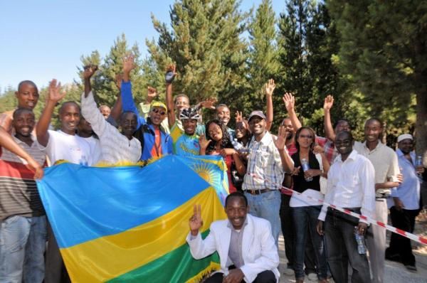 Adrien Niyonshuti (MTN/Qhubeka) and fans after he qualified for the 2012 Olympic Games