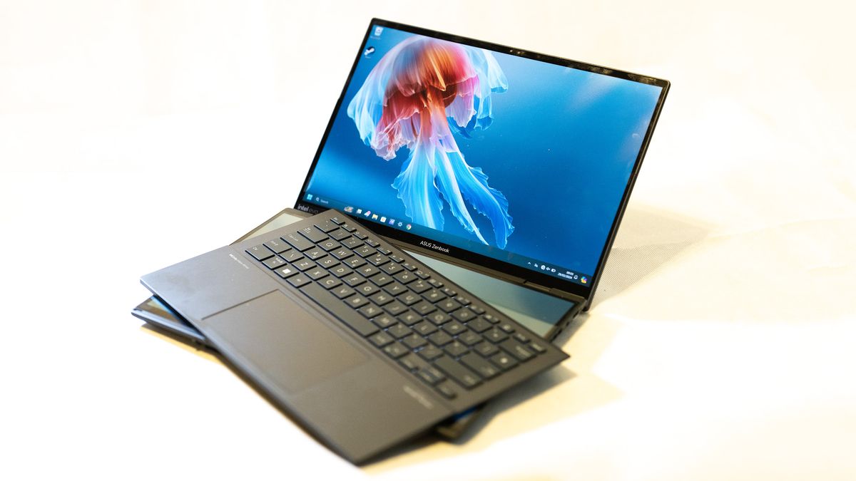 An ASUS Zenbook Duo OLED 2024 laptop on a white table