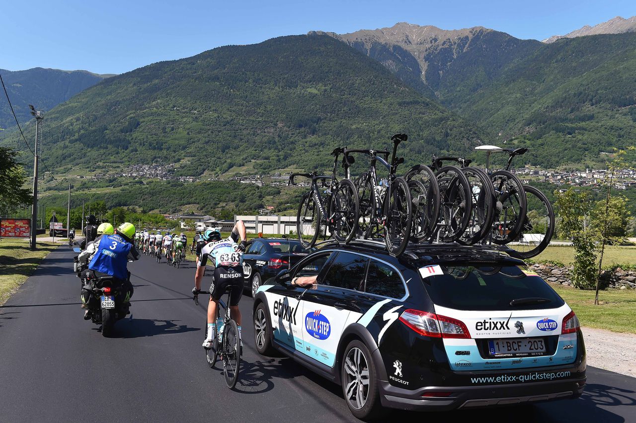Maxime Bouet (Etixx-Quick Step) drops back to the team car