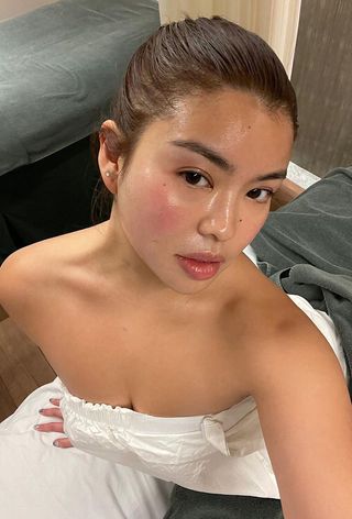 Content creator Allison Ho shows off post-facial moisturized skin.