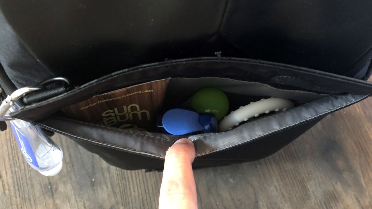 BP35 rear pocket with baby creams and lotions.