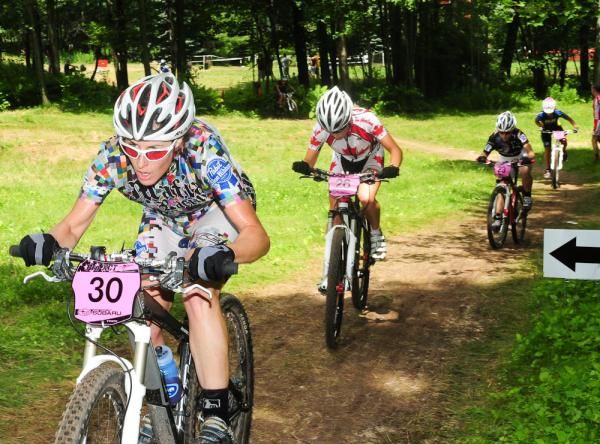 Kathy Sherwin (Mafia Racing) leading a group up the ski slope.