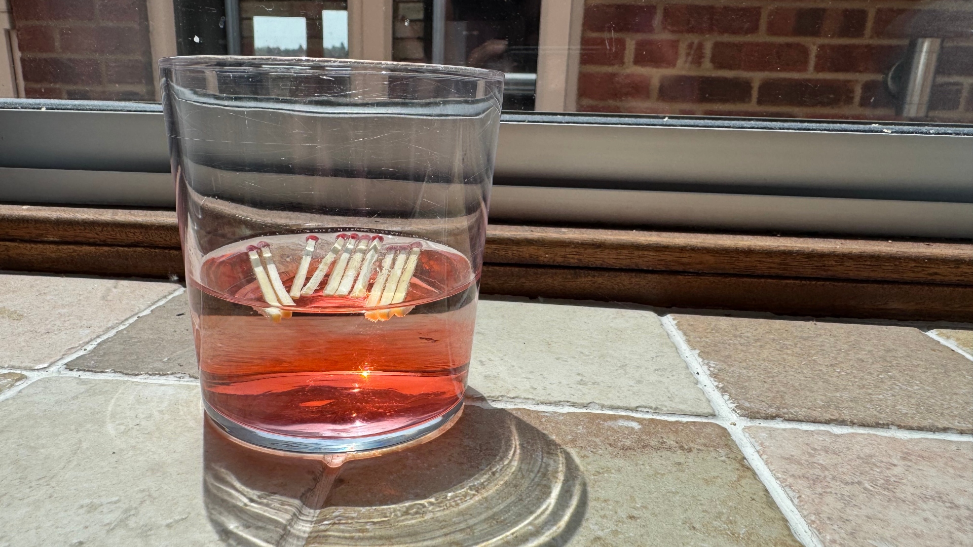 Using matches to make a fertilizer water for the garden