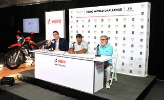 Tiger Woods (centre) with the Chairman, Managing Director and CEO of The Hero MotoCorp Dr Pawan Munjal (right) , and Jack Ryan (left) of The PGA Tour media team