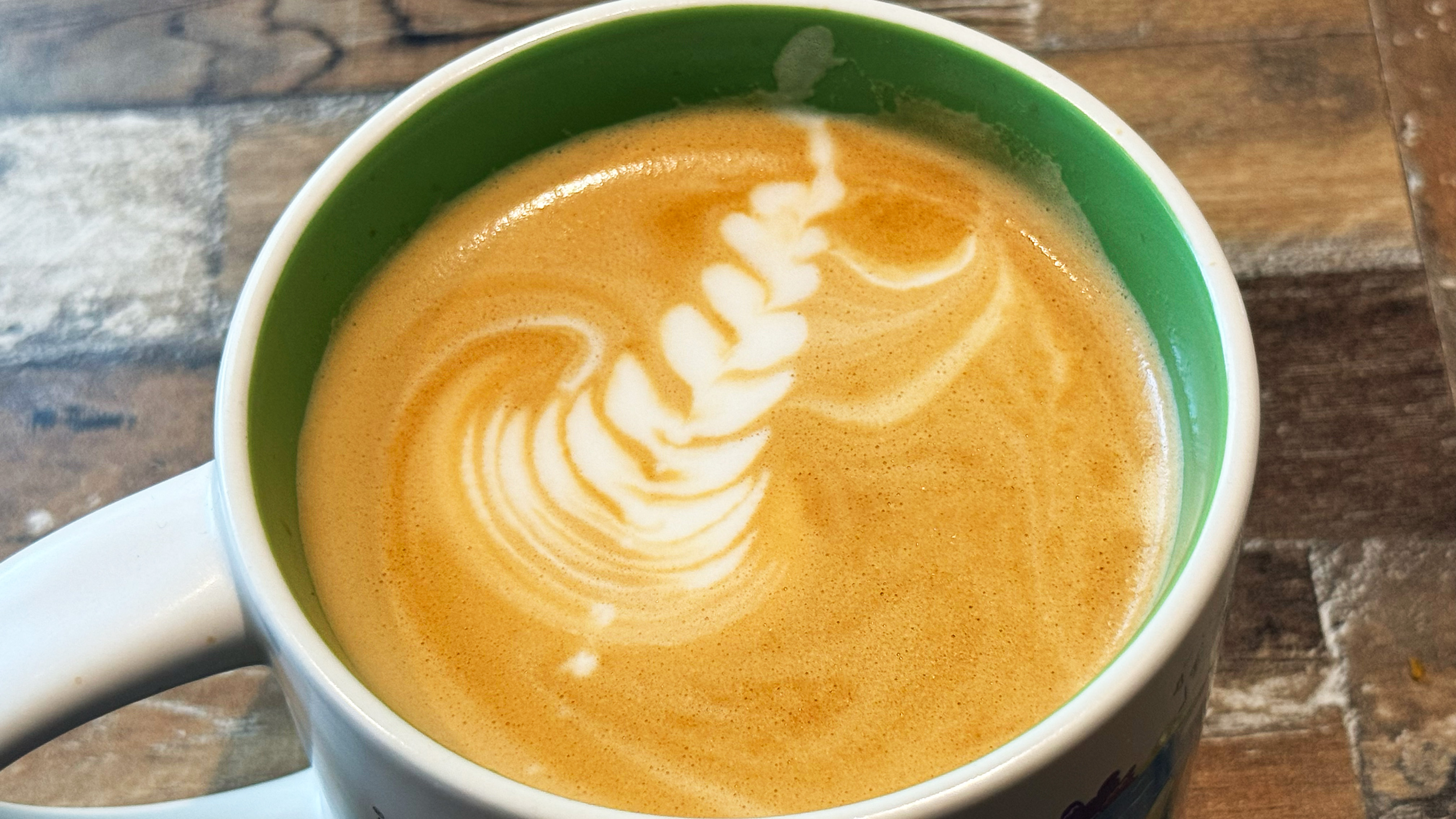 a photo of a milk drink made on the breville oracle dual boiler