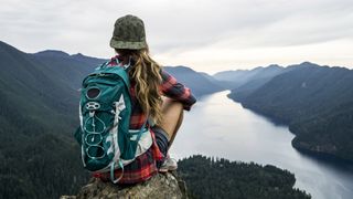 hiker enjoying a lake view