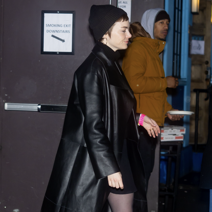 Emma Stone is seen on the Lower East Side on February 12, 2025 in New York City wearing a leather duster jacket