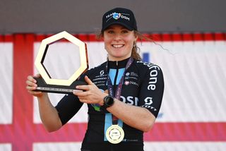 DUBAI UNITED ARAB EMIRATES FEBRUARY 09 Charlotte Kool of The Netherlands and Team DSM celebrates at podium as stage winner during the 1st UAE Tour Women 2023 Stage 1 a 109km stage from Port Rashid to Dubai Harbour UAETourWomen on February 09 2023 in Dubai United Arab Emirates Photo by Tim de WaeleGetty Images