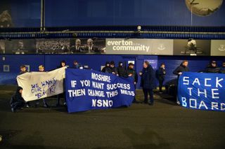 Everton fans stage a protest outside of Goodison Park