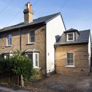 Brick single storey side extension with dormer window