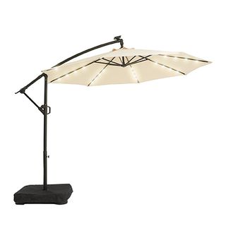 patio umbrella with lighting and a weighted base