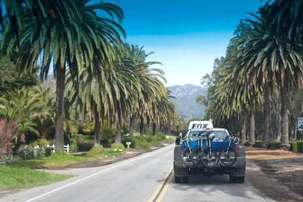 The Giant Factory Off-Road Team shuttles its downhill bikes and riders for another run to set up its suspension.