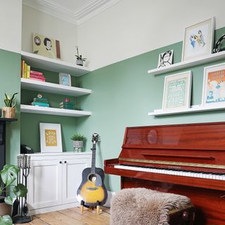 Victorian property revamp study home office with green walls and piano