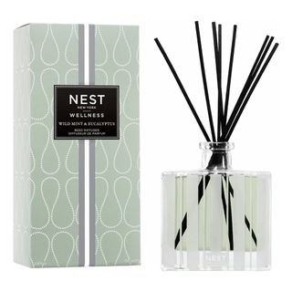  Nest NY Wild Mint & Eucalyptus Reed Diffuser in green glass vessel with matching box