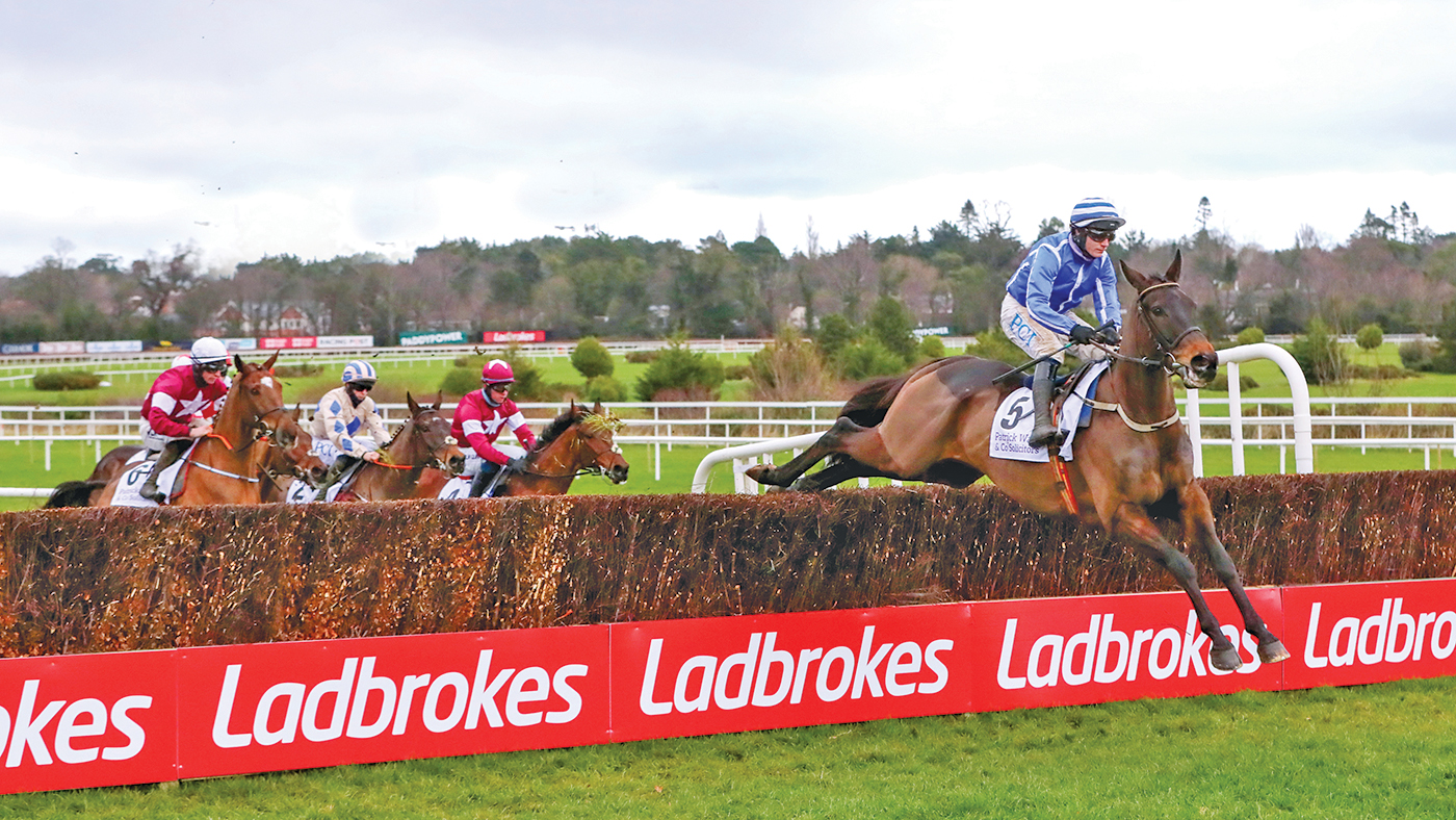 Energumene ridden by Paul Townend (right) clears a fence on their way to winning the Patrick Ward &amp;amp; Co. Solicitors Irish Arkle Novice Chase during day one of the Dublin Racing Festival at Leopardstown Racecourse. Picture date: Saturday February 6, 2021.