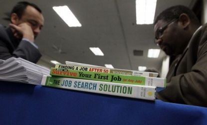 Job seekers get resume help at an expo in San Francisco, while the unemployment rate stubbornly hovers at 9 percent.