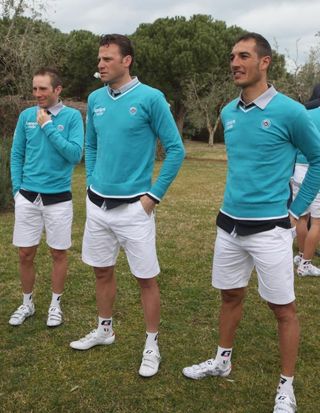 Alessandro Petacchi poses with some of his team-mates in team dress.