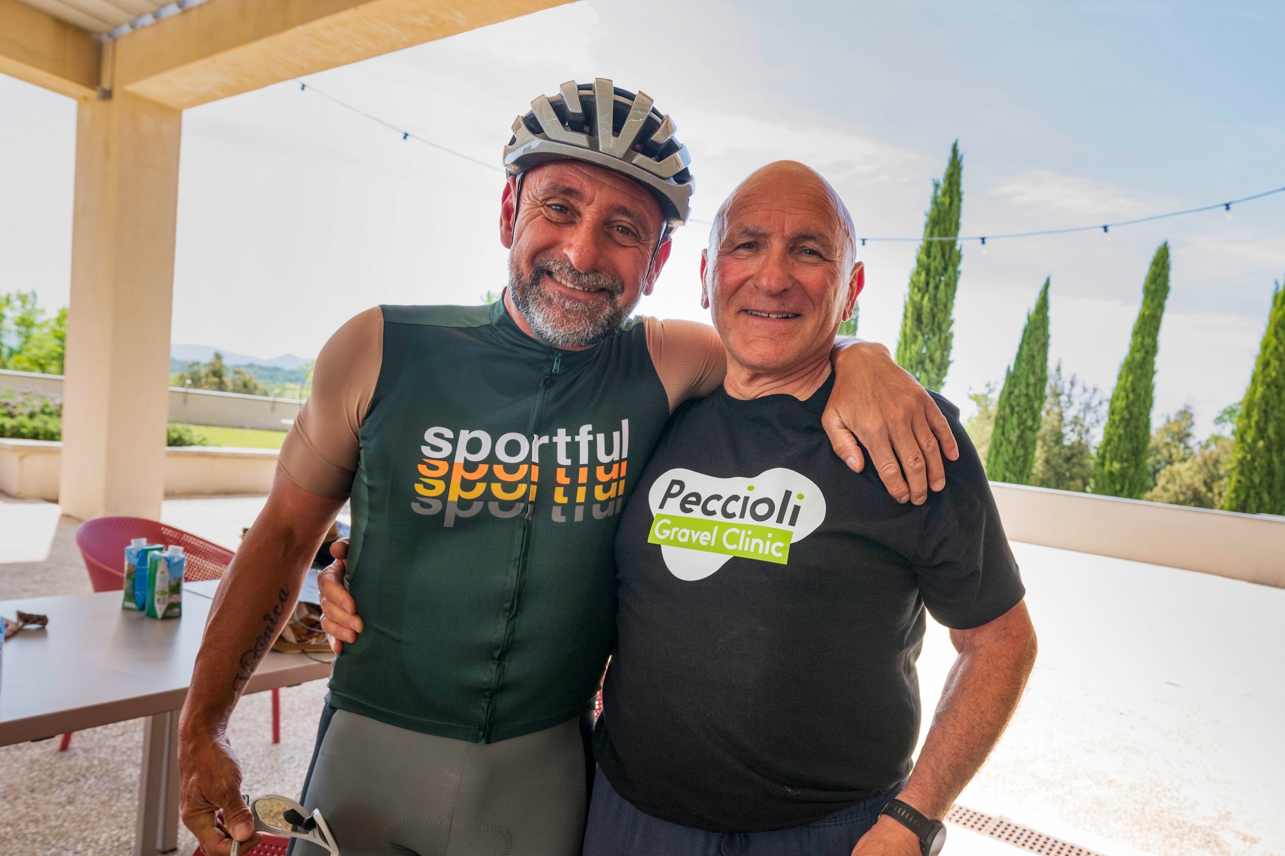 Paola Bettini standing with his arm around Oscar Veneziano