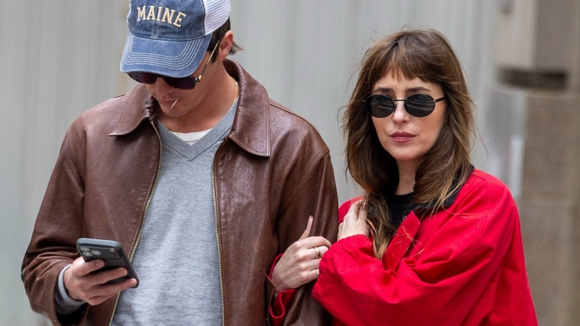 Dakota Johnson Mixes the Barn Jacket and Strawberry Red Spring Trends Into One Role Model Date Outfit