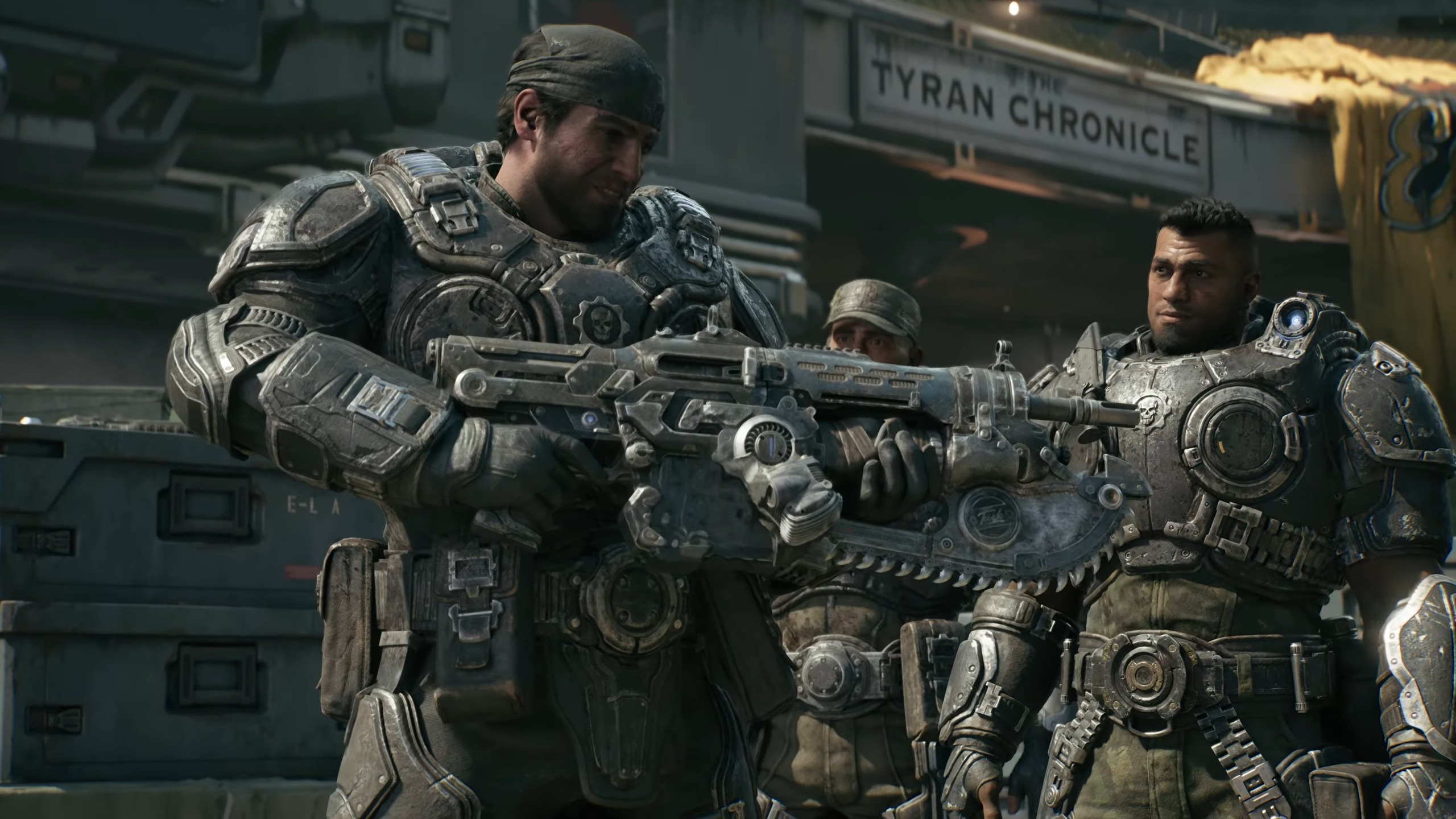 Gears of War: E-Day screenshot of Marcus Fenix revving a Lancer chainsaw.