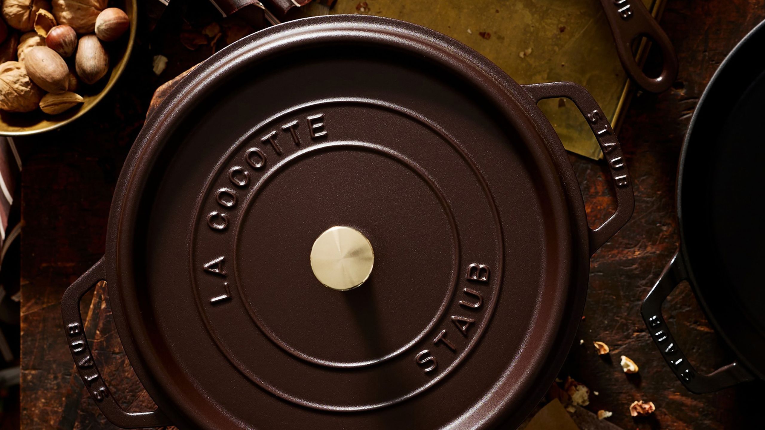 A deep brown cast-iron Dutch oven viewed from above.