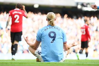 Erling Haaland of Manchester City celebrates their sides fifth goal and their hat trick during the Premier League match between Manchester City and Manchester United at Etihad Stadium on October 02, 2022 in Manchester, England.