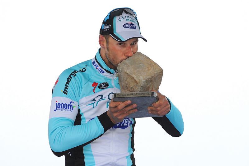 Tom Boonen kisses the cobble for a record equalling fourth time